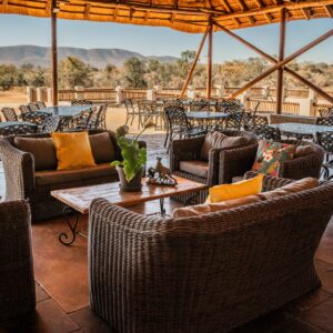 Students engaging in high rope course challenge